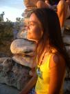 Fernanda watching the sunset at her preferred vista